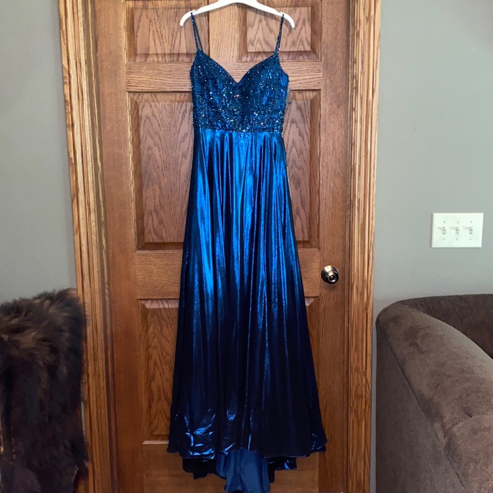 Dark teal floor length dress.